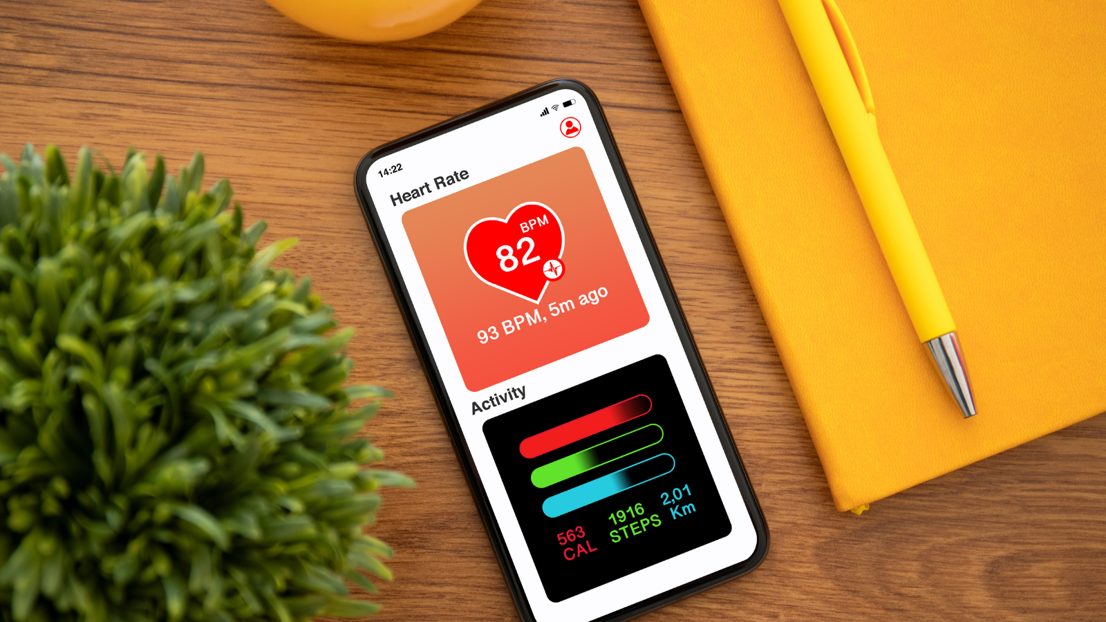 Smartphone with heart monitoring app on screen